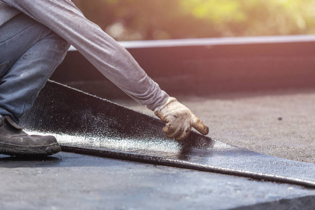Professional Basement Waterproofing technician working in Wales, WI